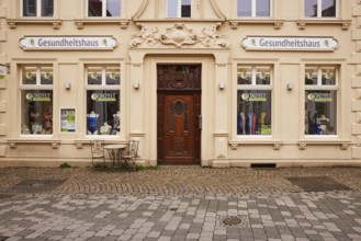 Shop window and façade of a historic medical supply shop, formerly a health centre, in Warendorf,