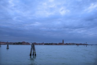 View of the island of Burano with the lighthouse in rainy weather, Venice, Veneto, Italy, Europe