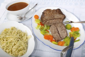 Swabian cuisine, roast beef, roast ox, herb spaetzle, meat dish, gravy, carrot vegetables, leek,