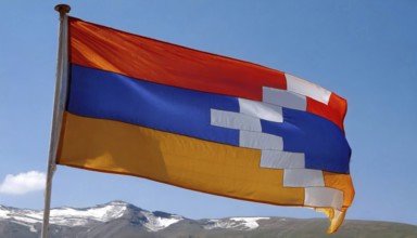 The flag of Nagorno-Karabakh flutters in the wind