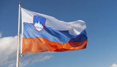 Flags, the national flag of Slovenia flutters in the wind