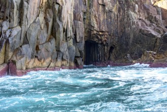 Cave in the cliff over the sea on the island of Ilhabela on the north coast of Sao Paulo, Ilhabela,