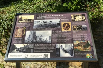 Local history information panel at village of Chiseldon, Wiltshire, England, UK