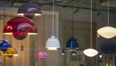 Coloured and white lamps in Nordic design in a shop window, Valby, Copenhagen, Denmark, Europe