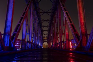 Illuminated steel structure of the heritage-protected lift bridge, Magdeburg, Saxony-Anhalt,