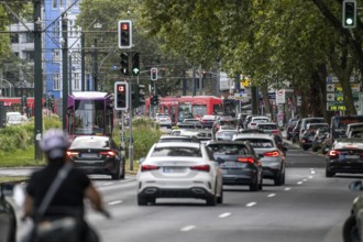 After-work traffic on Berliner Allee, cars and trams, Düsseldorf, North Rhine-Westphalia, Germany,