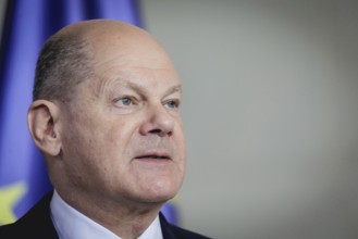 Olaf Scholz, Federal Chancellor, speaks at a press conference during the visit of Denis Becirovic,