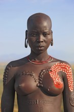 South Ethiopia, in the Maco National Park, woman from the Mursi tribe, Mursi woman with naked upper