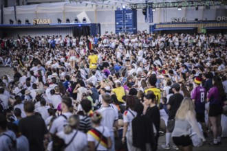 Scenes in the fan zone on Platz der Republik in front of the Reichstag building taken in Berlin, 29