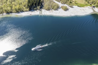 Aerial view of lake Lovatnet (or: Loenvatnet), local cruise ship on its way to Kjenndalstova,