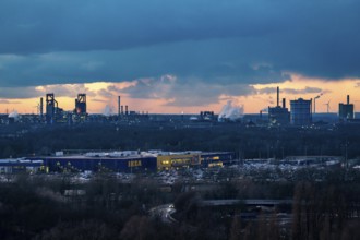 Skyline of the steel location Duisburg, Thyssenkrupp Steel Europe, in Duisburg-Bruckhausen, sunset,