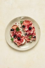 Sandwich with cream cheese, prosciutto with olives, breakfast