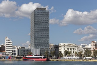 Harbour front with Piraeus Tower skyscraper, Kantharos Harbour, Piraeus, Athens, Attica, Greece,