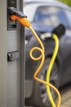 Electric cars at charging stations, Dresden, Saxony, Germany, Europe