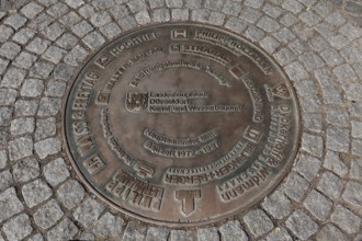 Plaque with names of civil engineering companies in front of the sculpture Nessie family, Hochtief,