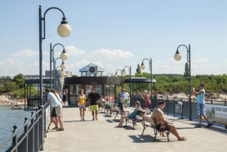 People on the pier in Miedzyzdroje, Western Pomerania, Baltic Sea, Poland, East Europe, Europe