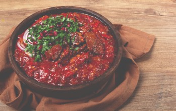 Chashushuli, a traditional Georgian dish, spicy, stewed meat with tomatoes and spices, homemade, no