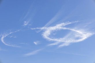 Scenic dramatic summer clouds. Cloudscape of bright blue sky. Cloud background