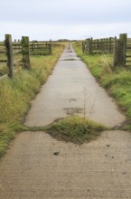 Orford Ness lighthouse Open Day, September 2017, Suffolk, England, UK, old military road crossing