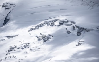 Snow and glacier ice with crevasses on the Waxeggkees glacier, Berliner Höhenweg, Zillertal Alps,