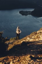 Trail running in autumn on the Jochberg on Lake Walchensee against the wonderful backdrop of the