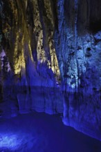 Stalactites illuminated by coloured LED light, stalactite cave, Höllgrotten, Baar, Canton Zug,