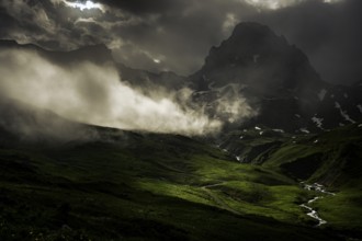 Peaks in the morning light and alpine landscape with dramatic clouds, Lech, Lechquellengebirge,