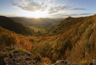 Panoramic photo with autumnal atmosphere on the Swabian Alb with the castle ruins of Hohen Neuffen