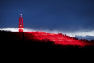 Artwork Illuminated at night with red illuminated slagheap Rheinpreussen by Otto Piene, Moers, Ruhr