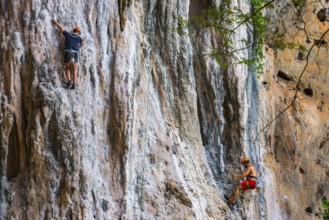 Rock climber at Phra Nang beach near Krabi, climber, outdoor, active holiday, climbing, rocks,