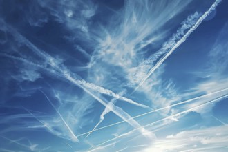 Sunny sky with condensation trails from airplanes. Generative Ai, AI generated