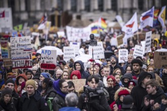 150, 000 people gather around the Bundestag in Berlin to build a human wall against the shift to