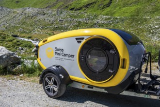 Mini caravan without standing height, swiss mini camper, Moiry glacier in the back, Valais,