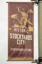 Oklahoma City, Oklahoma, A banner on a light pole in Stockyards City. The area has stores and