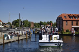 Europe, Germany, Mecklenburg-Western Pomerania, island town of Malchow, Lake Malchow, at the swing