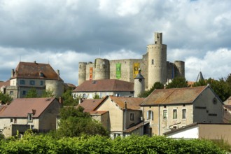 Billy. The fortress castle of the XIII Century, and its coloures banners, Allier.