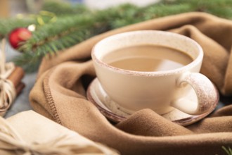 Christmas or New Year composition. Decorations, box, cinnamon, fir and spruce branches, cup of