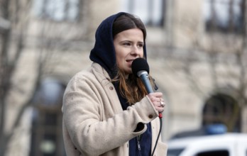 Luisa Neubauer speaks during a demonstration by Fridays for Future for compliance with climate