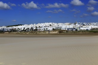 Sandy beach and village of Conil de la Frontera, Cadiz Province, Spain, Europe