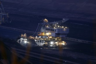 Lignite excavators extract coal in the Welzow open-cast mine, operated by LEAG. The lignite is