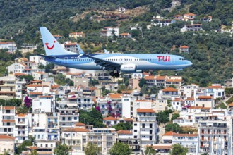 A TUI Airways Boeing 737-800 aircraft with the registration G-TAWO at Skiathos Airport, Greece,