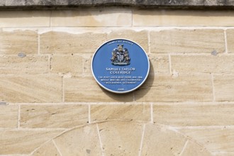 Blue plaque on building where Samuel Taylor Coleridge lived 1814-1816, Calne, Wiltshire, England,