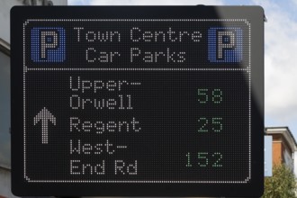 Electronic information sign about car parks and available spaces in town centre, Ipswich, Suffolk,