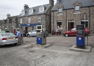 Petrol pumps and shop in the main shopping street in Castlebay the largest settlement in Barra,