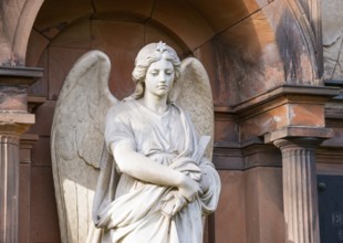 Female white angel figure, with star on the top of her head, angel statue with pensive facial