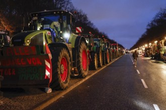 Thousands of farmers demonstrate with their tractors against the planned cancellation of the