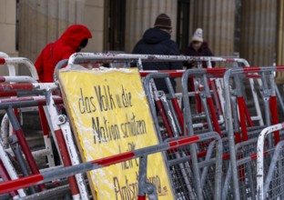 Demonstration, posters and barriers at the Brandenburg Gate, Berlin, Germany, Europe