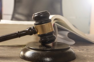 Close-up of a judge's gavel as a symbolic image for a court judgement