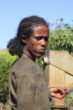 Amhara region, local woman at the well, looks very serious, stern, Ethiopia, Africa