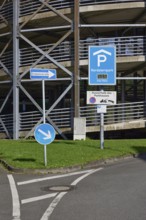 Traffic sign for the multi-storey car park and one-way street sign in Nordsternpark, Gelsenkirchen,